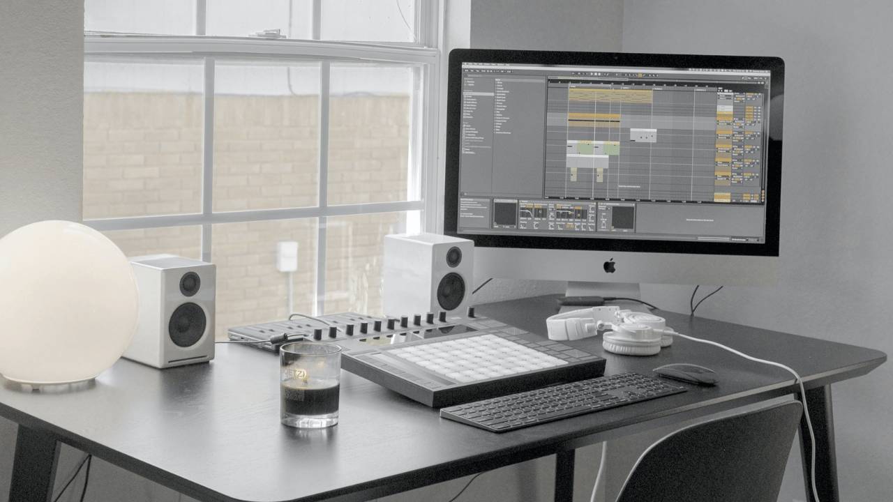 Ableton Intro and Ableton Lite differences are compared on a computer